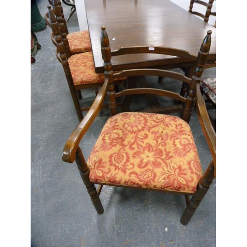 288 - Oak veneered dining table and a set of six ladder-back dining chairs, including two carvers, also a ... 