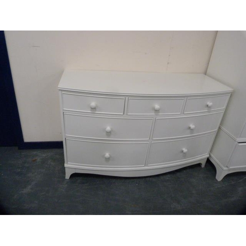 296 - Laura Ashley white painted three piece bedroom suite comprising a pair of two-door wardrobes, each w... 