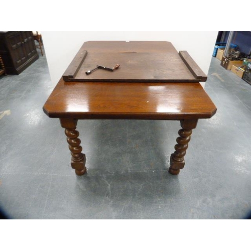 312 - Oak telescopic dining table, c. early 20th century, with one additional leaf, on barley column suppo... 