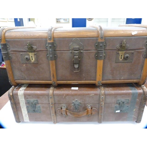 314 - Two vintage wood-bound travel trunks.