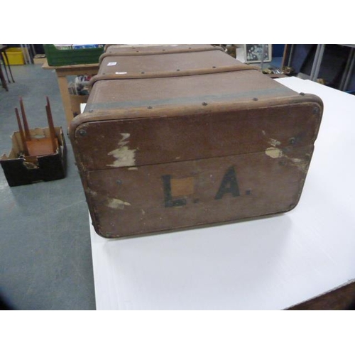 314 - Two vintage wood-bound travel trunks.