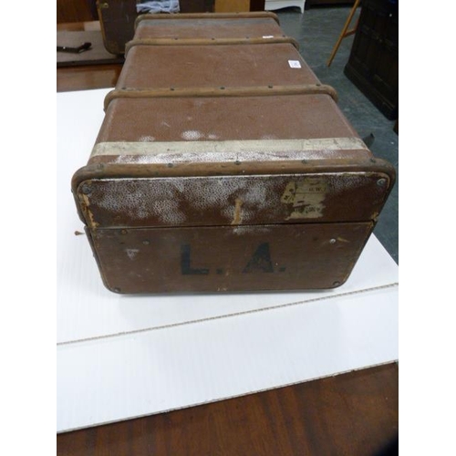 314 - Two vintage wood-bound travel trunks.