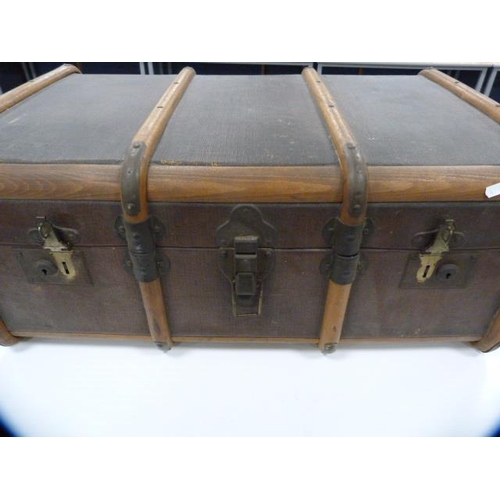 314 - Two vintage wood-bound travel trunks.