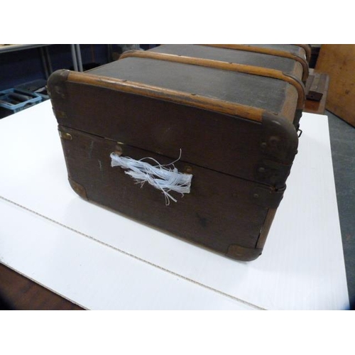 314 - Two vintage wood-bound travel trunks.