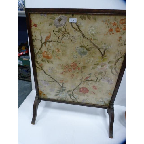 316 - Copper bed warming pan and an oak-framed fire screen bearing an Oriental silk embroidered panel to t... 