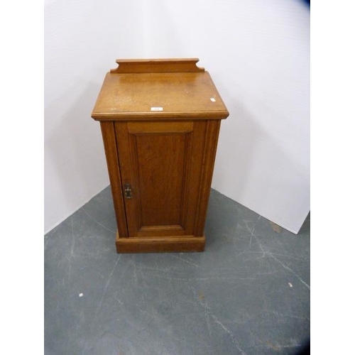 318 - Edwardian oak bedside cupboard.