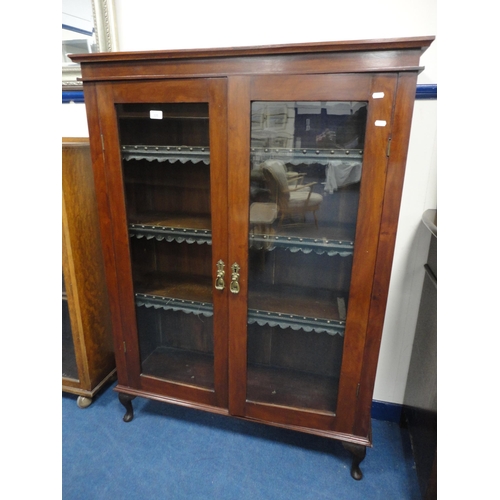 320 - Mahogany glazed two-door bookcase.