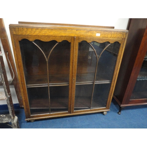 322 - Vintage oak glazed two-door bookcase.