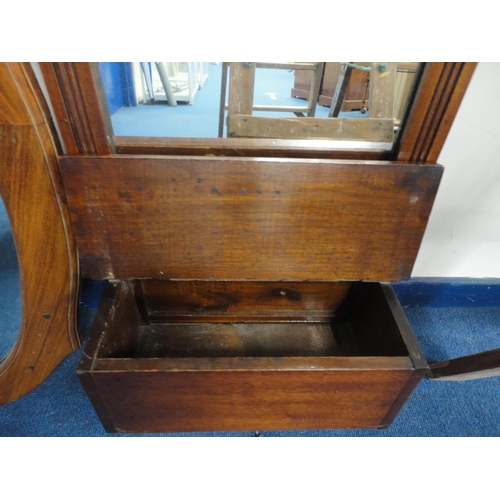 324 - Mahogany toilet mirror above shelf and a shaped wall mirror.  (2)