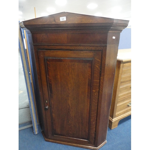 326 - Antique oak corner cupboard.