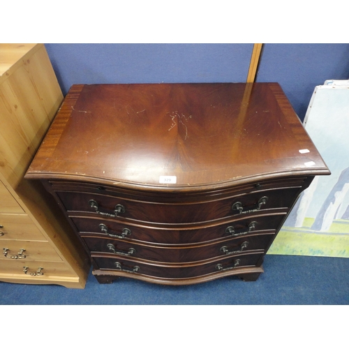 329 - Reproduction mahogany serpentine chest of drawers.