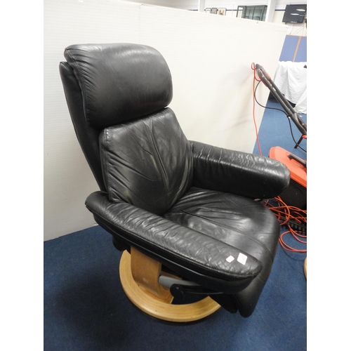 342 - Contemporary black leather reclining armchair with matching stool.  (2)