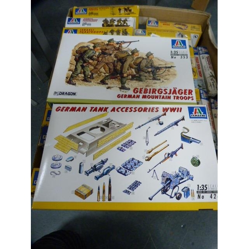 56 - Carton containing Italeri military model kits.