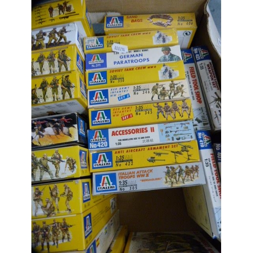 56 - Carton containing Italeri military model kits.