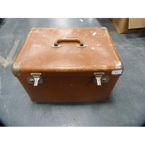 63 - Carry case and a gent's vintage cased toilet set.