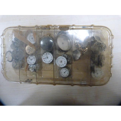 80 - Small tub containing ladies and other antique watch cases, dials, parts and a large quantity of stai... 