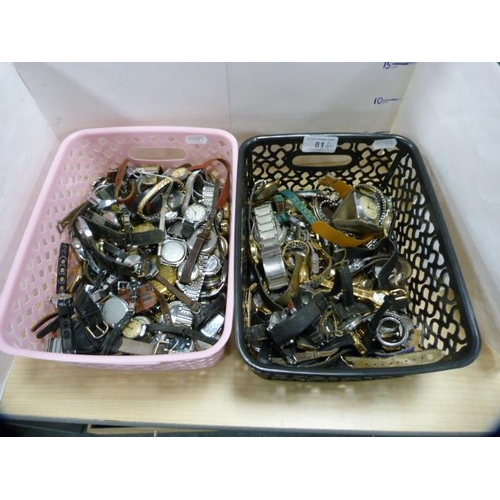 81 - Two tubs containing manual wind and other watch parts, movements, cases etc.