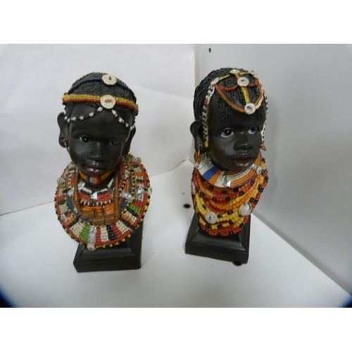 94 - African-style hardwood busts, walking stick, Capodimonte-style vase and an Indian-style candle sconc... 