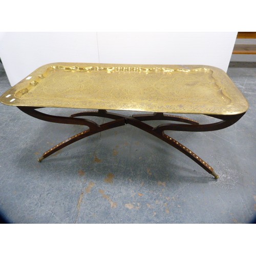 345 - Indian Benares brass rectangular coffee table on bone inlaid folding supports.