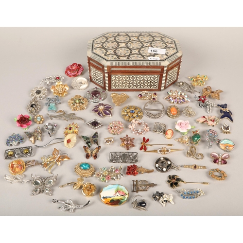 166 - Quantity of costume jewellery in mother of pearl box