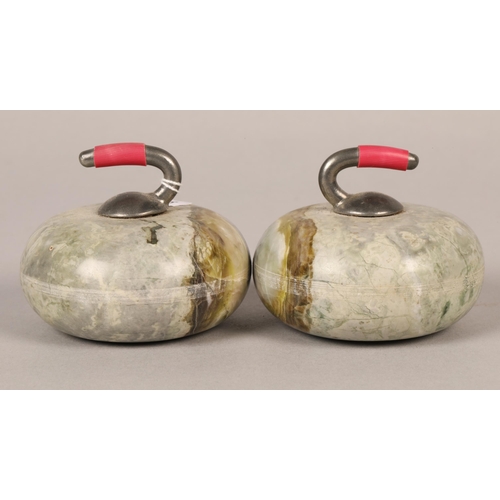 189 - Pair of paperweight curling stones, 7 cm diameter (2)