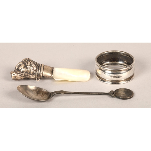 191 - Silver and mother of pearl childs rattle in the form of a dog, silver napkin ring (3)