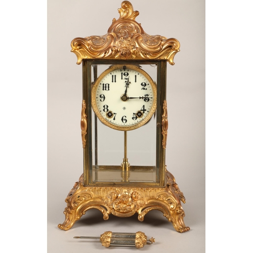 234 - 19th century American Ansonia gilt metal four glass clock, eight day movement with a mercury pendulu... 