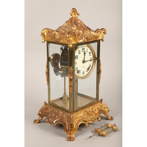 234 - 19th century American Ansonia gilt metal four glass clock, eight day movement with a mercury pendulu... 