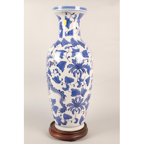 269 - Large Oriental blue and white baluster vase with stand, 60cm height