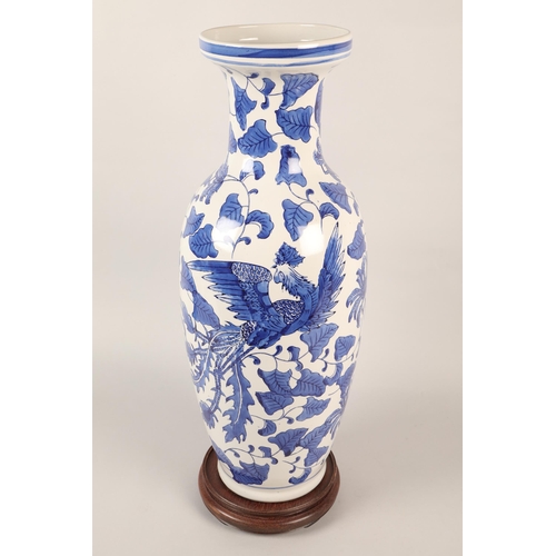 269 - Large Oriental blue and white baluster vase with stand, 60cm height