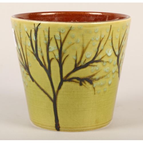 334 - Poole Pottery plant pot with tree decoration