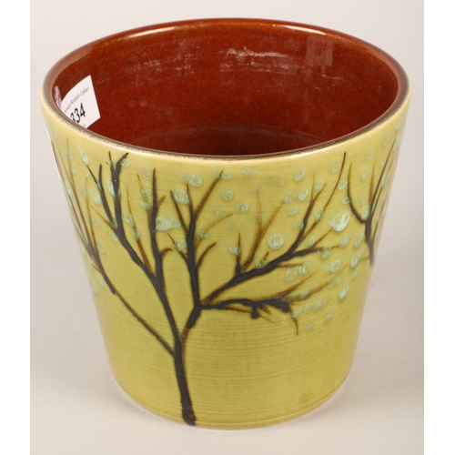 334 - Poole Pottery plant pot with tree decoration