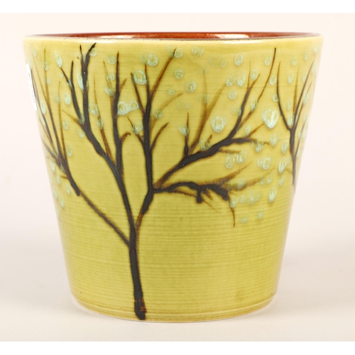 334 - Poole Pottery plant pot with tree decoration