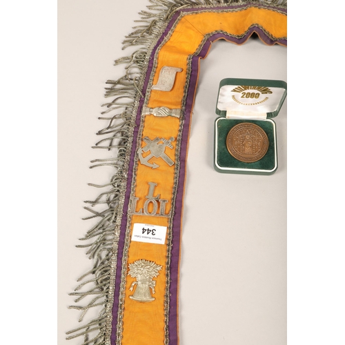 344 - Orange Order sash along with 'Kilwinning 2000' coin, possibly Order-related too