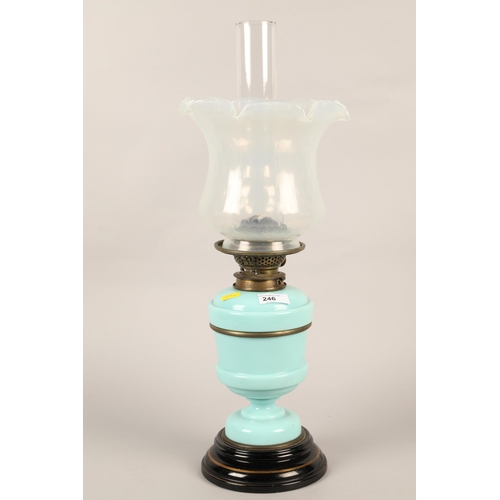 246 - Oil lamp with floral shaped glass shade