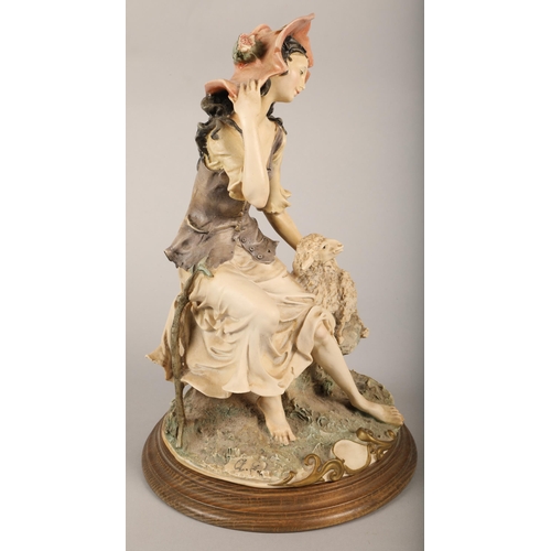 251 - Two Capodimonte-style figures, a gentleman and lady 