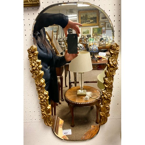 457 - Mirror with ornate gilt border on both sides, 57.5cm x 30cm