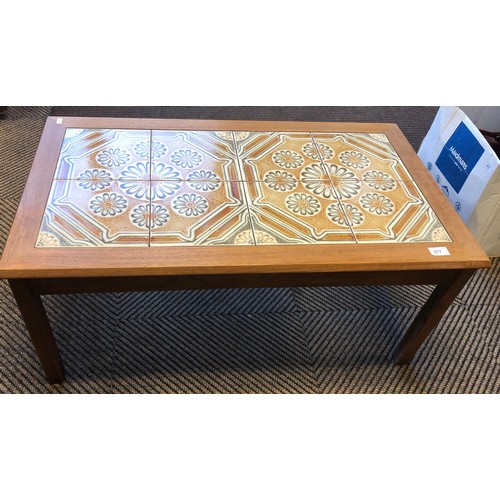 577 - Coffee table topped with inlaid floral tiles, 92cm x 41cm