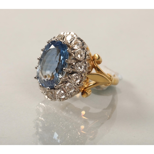 109 - Ladies 18 ct gold blue topaz & diamond ringring size l/m