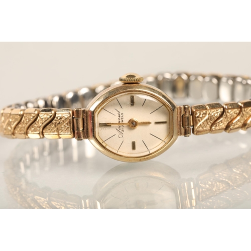 118 - 9 ct gold Accurist ladies watch with expandable strap