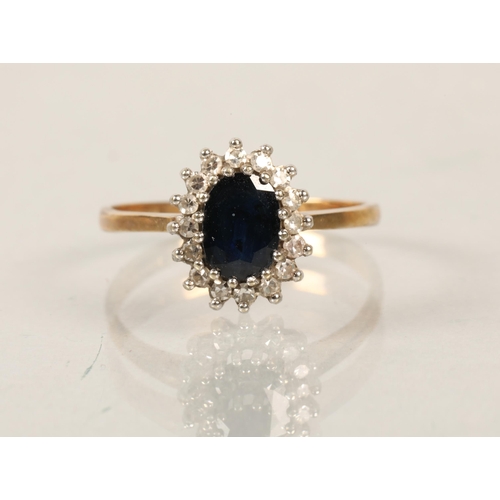 132 - 9 ct  gold diamond and sapphire ring.ring size p