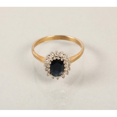 132 - 9 ct  gold diamond and sapphire ring.ring size p