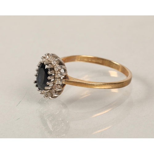 132 - 9 ct  gold diamond and sapphire ring.ring size p