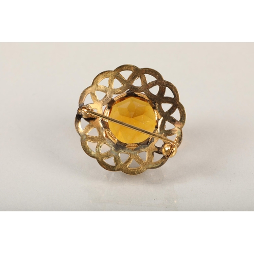 53 - Gold plated Celtic brooch orange stone