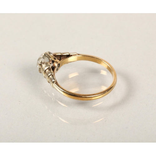 61 - 9 ct yellow gold ring with white stone