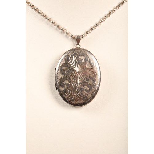 73 - Large silver locket on chain