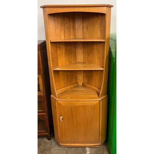 684 - Teak corner cabinet