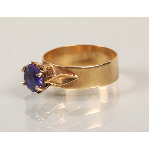 144 - 9ct gold dress ring with purple stone