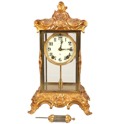 19th century American Ansonia gilt metal four glass clock, eight day movement with a mercury pendulum