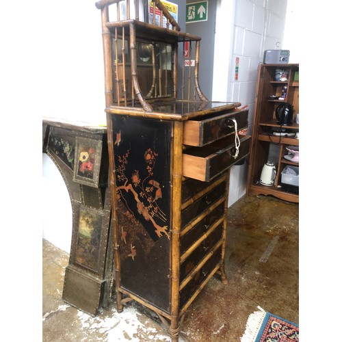 596 - Oriental lacquered bamboo side chest with mirror back.180 cm high 66 cm wide